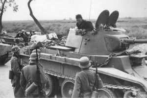 German soldiers meet Russian Soldiers in a T34 Tank.  In roughly two years' time they would be fighting each other and the T34 would be one of the reasons for Russia's eventual victory. 